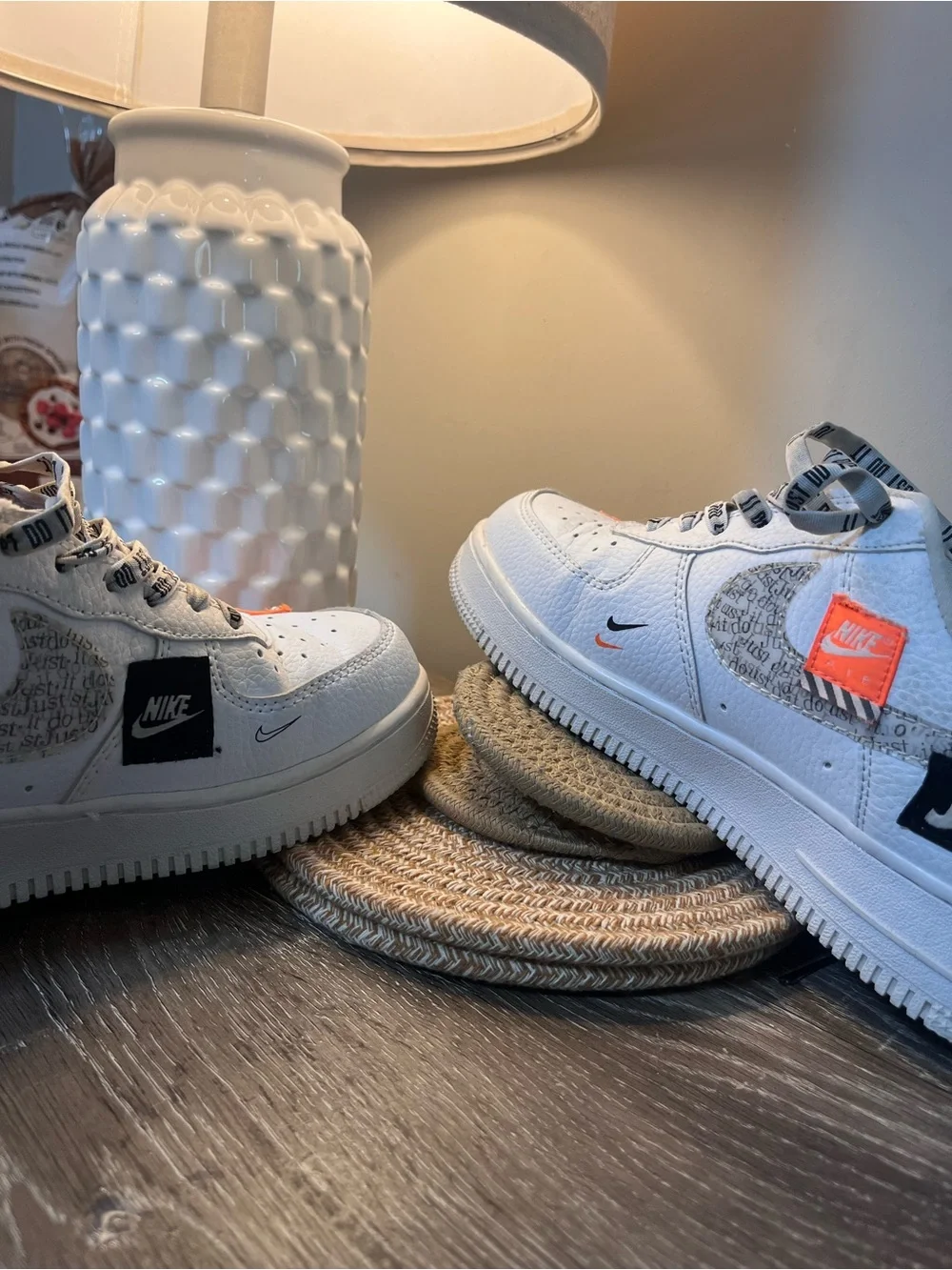 Nike Women's White Low-Top Sneakers with Black Logo and Orange Accents